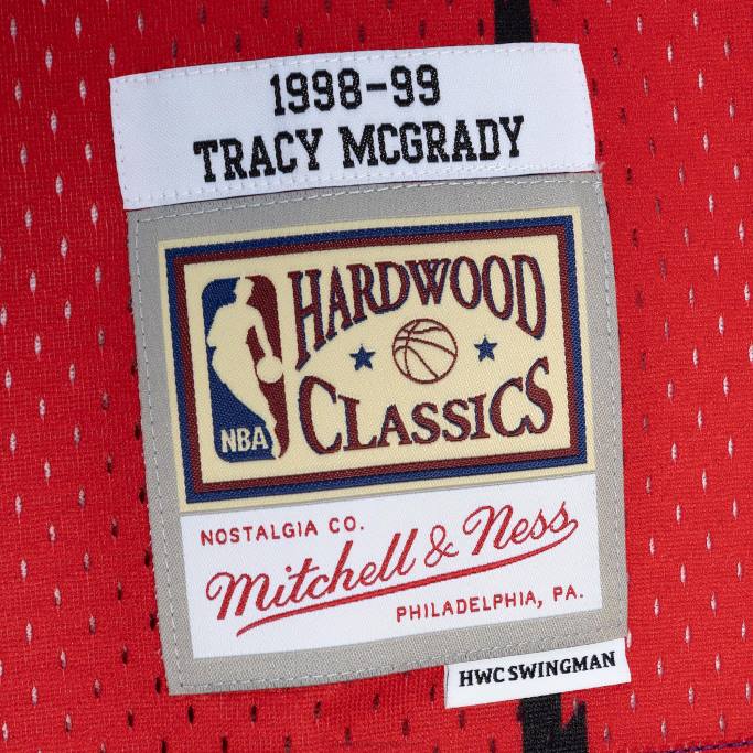 NBA 0F6D1338 toronto raptors tracy mcgrady mitchell & ness púrpura / rojo hardwood classics split swingman jersey